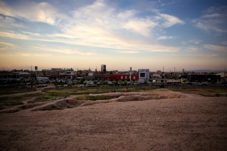Views of pottery sherds, previous excavation sites, and the mound itself at 'Kelik Mishik' archaeological mound in Erbil 07