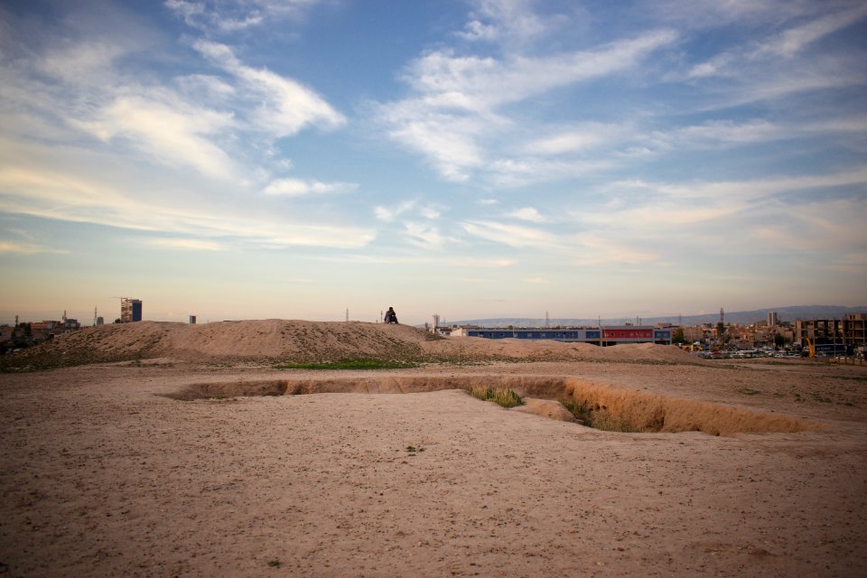 Views of pottery sherds, previous excavation sites, and the mound itself at 'Kelik Mishik' archaeological mound in Erbil 02