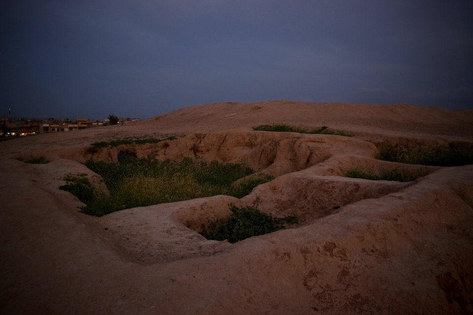 Views of pottery sherds, previous excavation sites, and the mound itself at 'Kelik Mishik' archaeological mound in Erbil 31