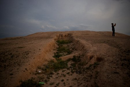 Views of pottery sherds, previous excavation sites, and the mound itself at 'Kelik Mishik' archaeological mound in Erbil 27