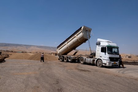 Views of the governmental grain depot in summer of 2019 in Shingal where Ezidi laborers are packing grain 11