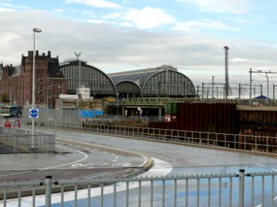 View on the central station of Amsterdam city; the East-side of the building, seen from Oosterdokseiland, autumn 2006 photo