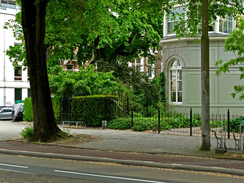 View on a conservatory-building on the corner of the botanical garden Amsterdam; high resolution image by FotoDutch in June 2013