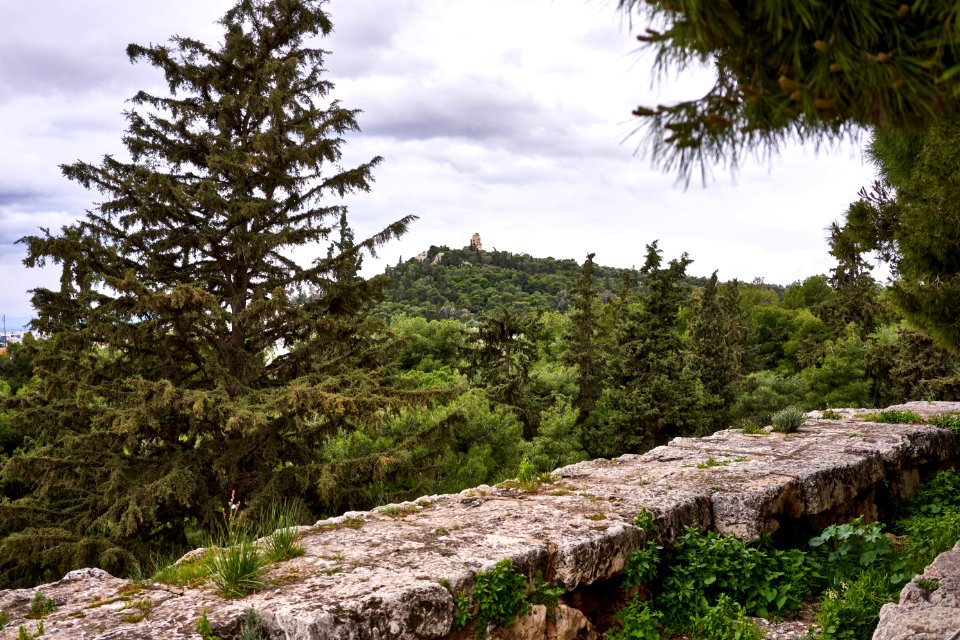 View of the Philopappos Hill from the ruins of the Stoa of Eumenes