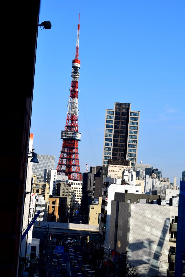 View of Tokyo Tower and Higashigaien street from top of building where bar Propaganda is