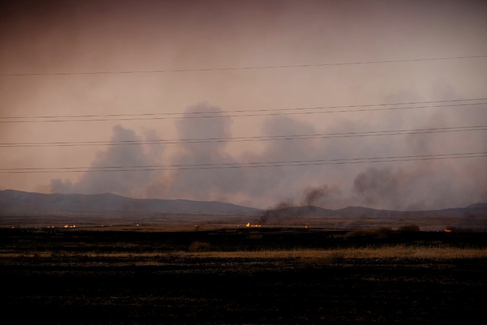 View of the smokey skyline in Sinjar during the 2019 fires that ravaged the region - 14