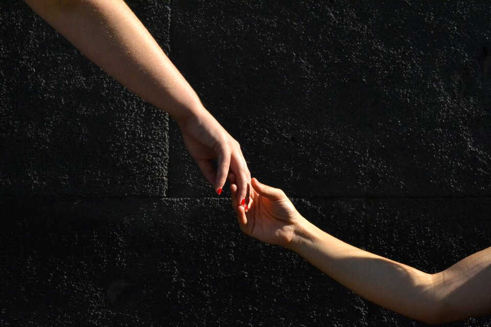 Hands together force solidarity