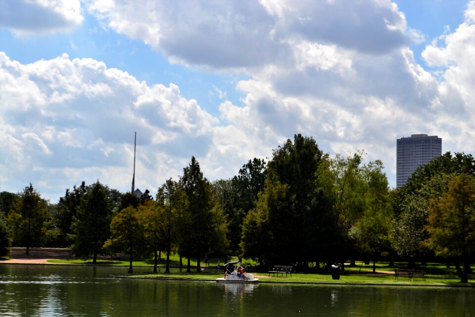 Boat ride trees grass photo