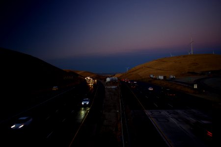 Views of windmills and pasture land at sunset at Altamont Pass Wind Farm 07