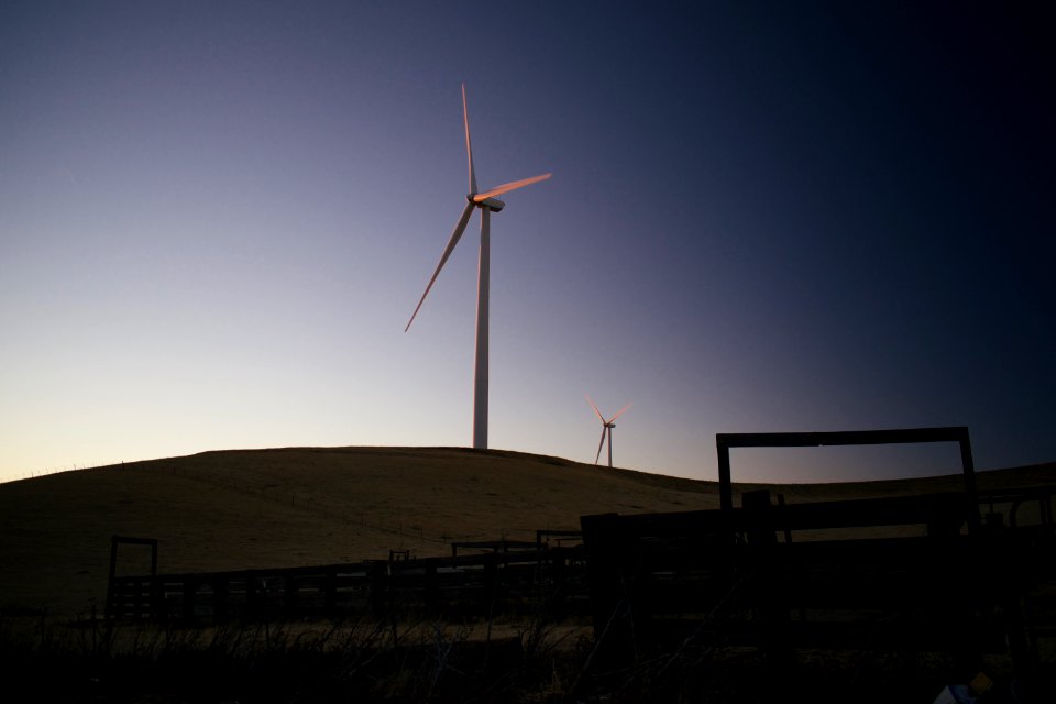 Views of windmills and pasture land at sunset at Altamont Pass Wind Farm 01