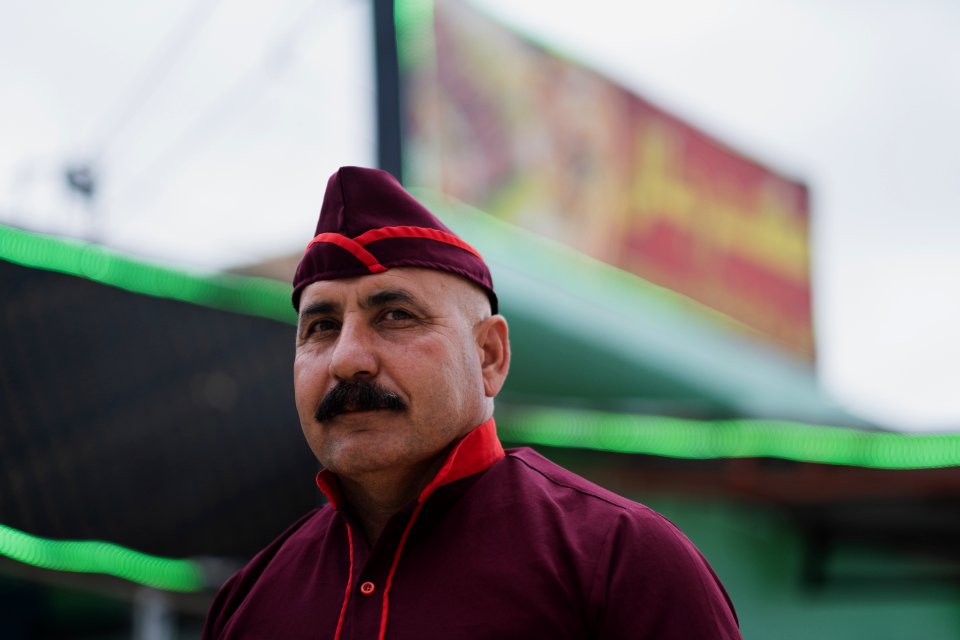 Views of the owner and his son of a recently reopened restaurant in Shingal, following war with the Islamic State 02