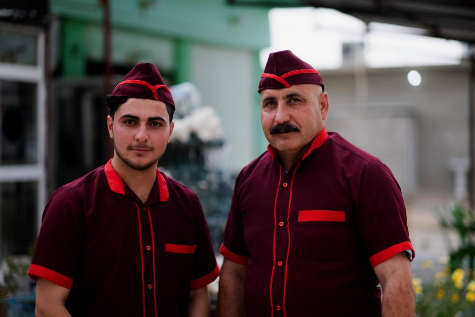 Views of the owner and his son of a recently reopened restaurant in Shingal, following war with the Islamic State 09