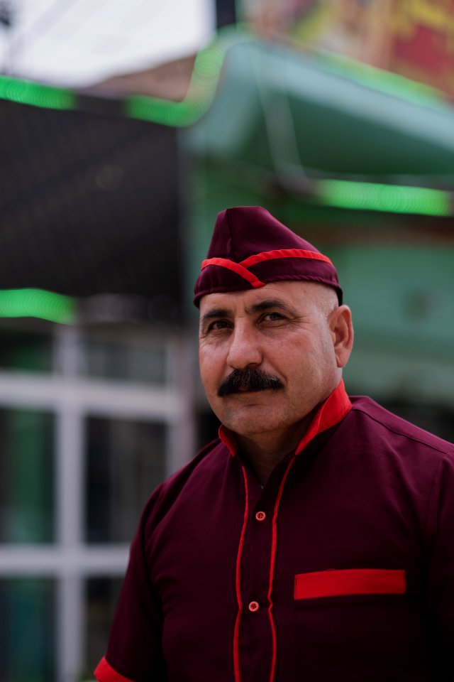 Views of the owner and his son of a recently reopened restaurant in Shingal, following war with the Islamic State 01