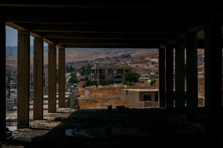 Views on 28th June 2019 around the destroyed city center of Shingal while a field fire rages south of the city 14