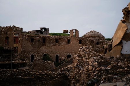 Views in May of 2019 of a cathedral rising over the destruction of the old city of Shingal after the war with the Islamic State 21