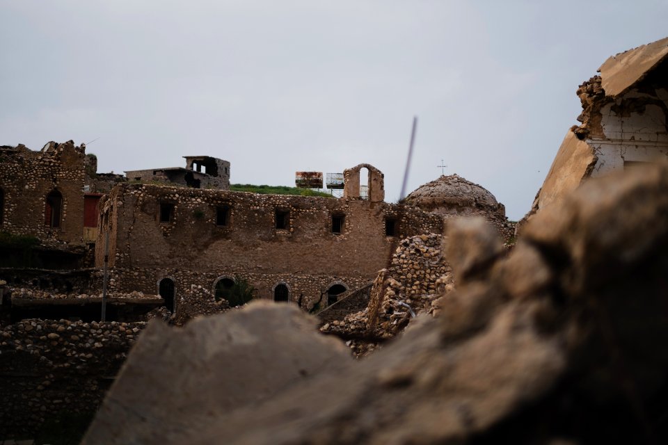Views in May of 2019 of a cathedral rising over the destruction of the old city of Shingal after the war with the Islamic State 19