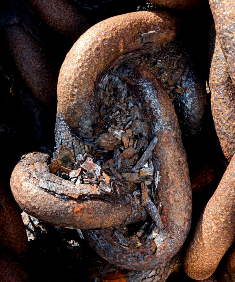 Very rusty chain on a sunny day