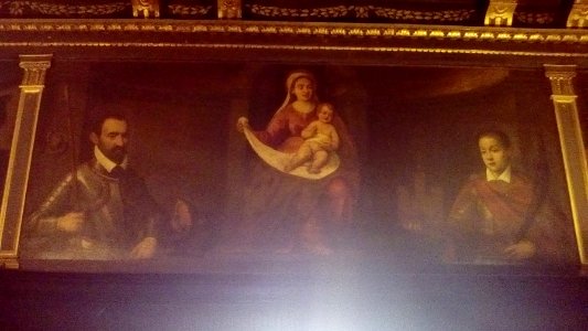 Vergine con Gesù bambino, un confratello e San Trifone