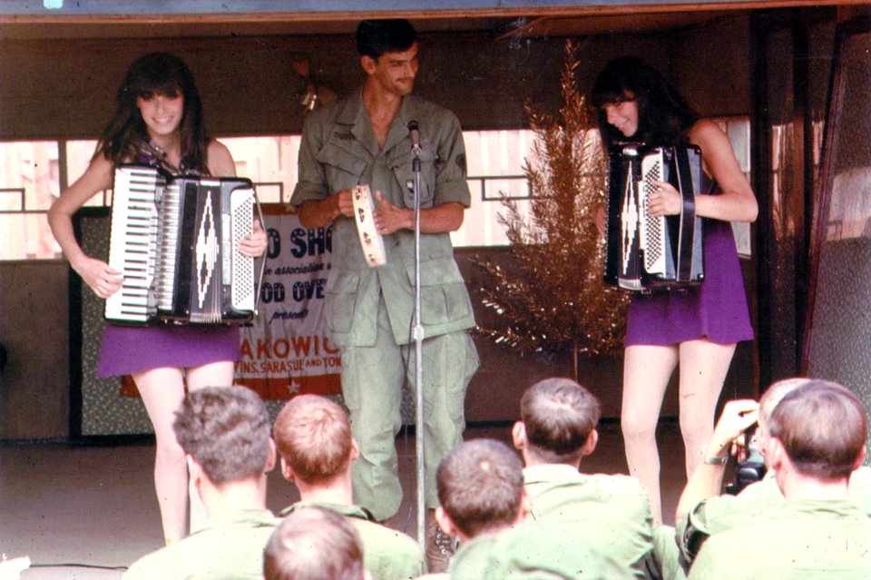 Vietnam Twins w soldier holding tamboreen