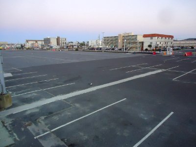 View from boardwalk looking at hotels and buildings and parking lot at Wildwood New Jersey photo