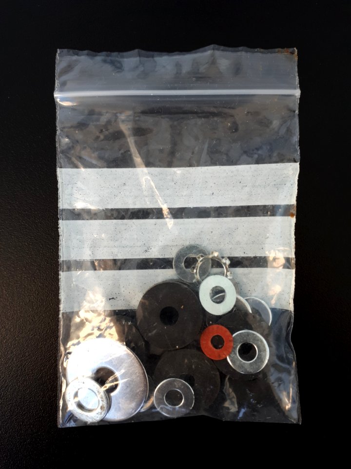 Washers in a transparent zipper storage bag - B