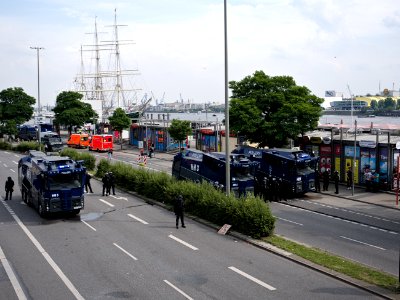 Water cannons next to the Landungsbrücken during G20 summit Hamburg 08