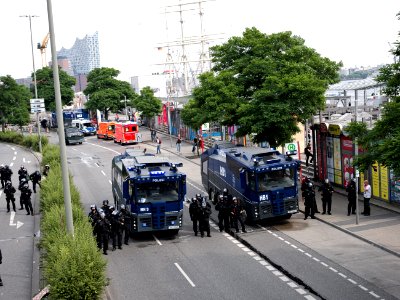 Water cannons next to the Landungsbrücken during G20 summit Hamburg 07