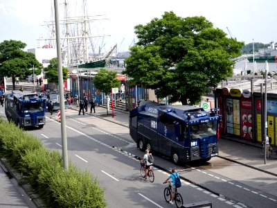 Water cannons next to the Landungsbrücken during G20 summit Hamburg 10