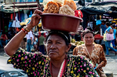 Wayuu woman selling fresh coconut photo