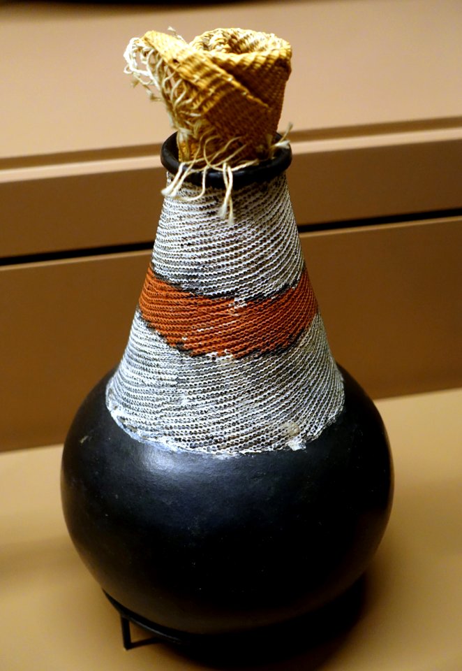 Water or milk jar, Ganda people, Uganda, early 1900s, clay, graphite, natural pigments, raffia - National Museum of Natural History, United States - DSC00466