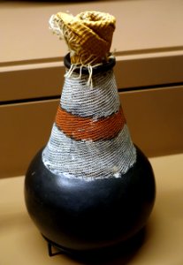 Water or milk jar, Ganda people, Uganda, early 1900s, clay, graphite, natural pigments, raffia - National Museum of Natural History, United States - DSC00466