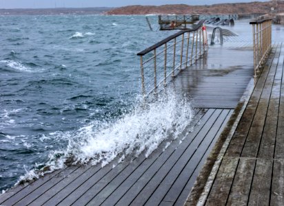 Waves crashing up through the boardwalk in Lysekil during Storm Ciara 1