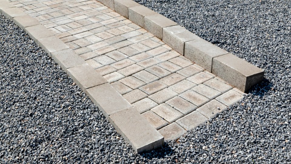 Walkway paved with cement blocks
