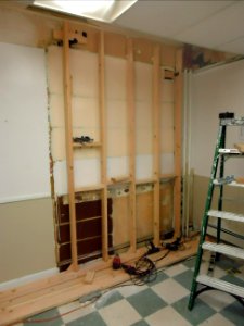 Wall being built to contain electric wiring photo
