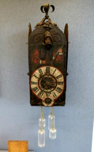 Wall clock with illustration of a sundial maker, Southern Germany, c. 1570, iron, oak - Germanisches Nationalmuseum - Nuremberg, Germany - DSC03748