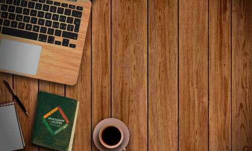 Macbook wooden background book