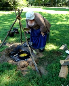 Washington Crossing NJ State Park volunteer demonstrating cooking