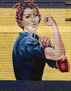 Rosie the riveter symbol icon