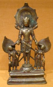 Vishnu with two attendants, Kashmir, 8th-9th century, brass with silver inlay, HAA