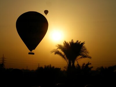 Sunrise backlighting hot air balloon