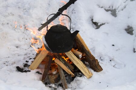 Tea kettles cook snow
