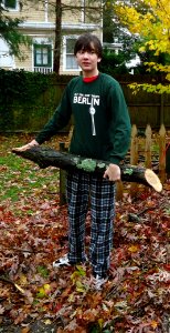 Volunteers assist with tree removal at neighbors house after Hurricane Sandy