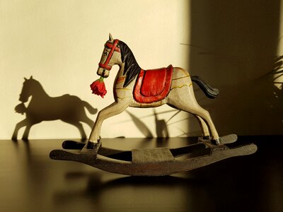 Rocking horse toy statuette photo