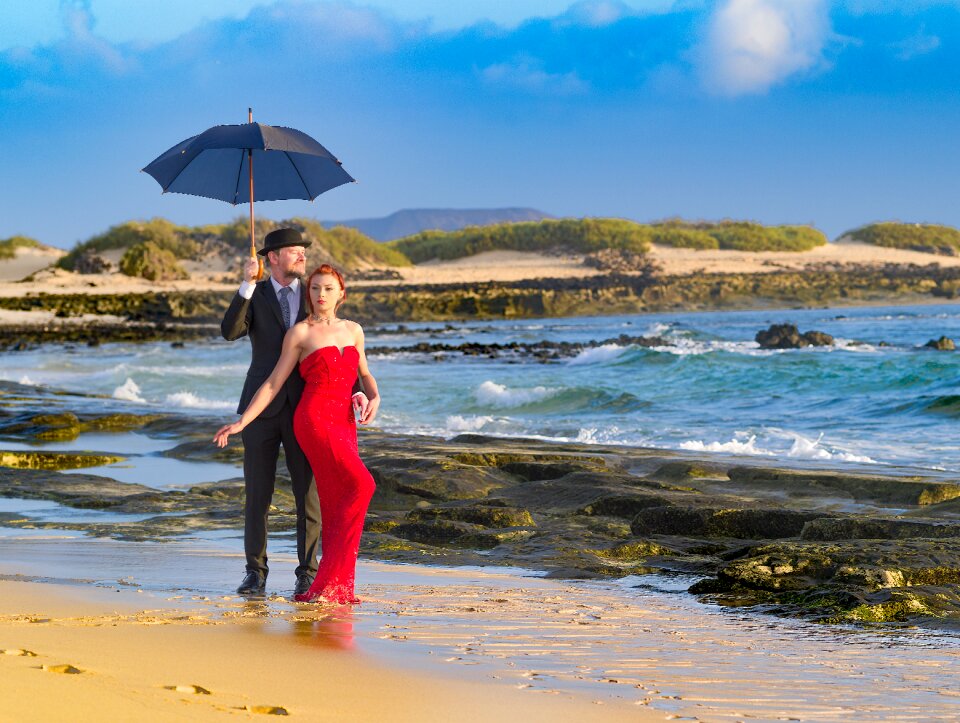 Red dress duo beach