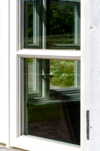 Window through a window in Röe gård café 2