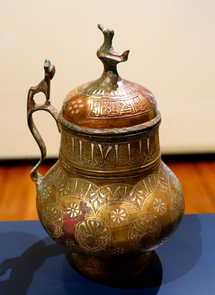 Wine mug calling for God's favor on the owner, Iran, Khorasan, late 12th to early 13th century AD, silver-inlaid brass, view 1 - Aga Khan Museum - Toronto, Canada - DSC06377