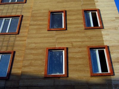 Windows of new apartment under construction - - near nishapur local government building and Simorgh culture house - at morning 5