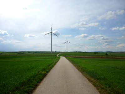 Wind turbine in lush field - This photo has been released into the public domain. There are no copyrights you can use and modify this photo without asking, and without attribution photo