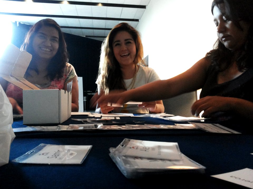 Wikimania 2015-Tuesday-Volunteers organise the attendee badges