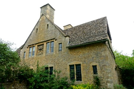 William Morris Memorial Cottage, with relief of Morris by George Jack, view 1 - Kelmscott, Oxfordshire, England - DSC09932